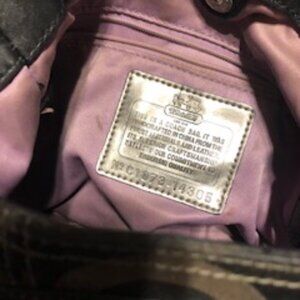 Coach Bag, black outside, lavender outside.